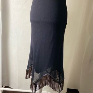 BETSEY JOHNSON fitted, fringed skirt.